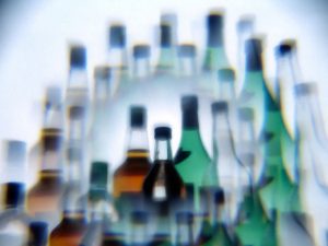 1024px-Alcohol_bottles_photographed_while_drunk